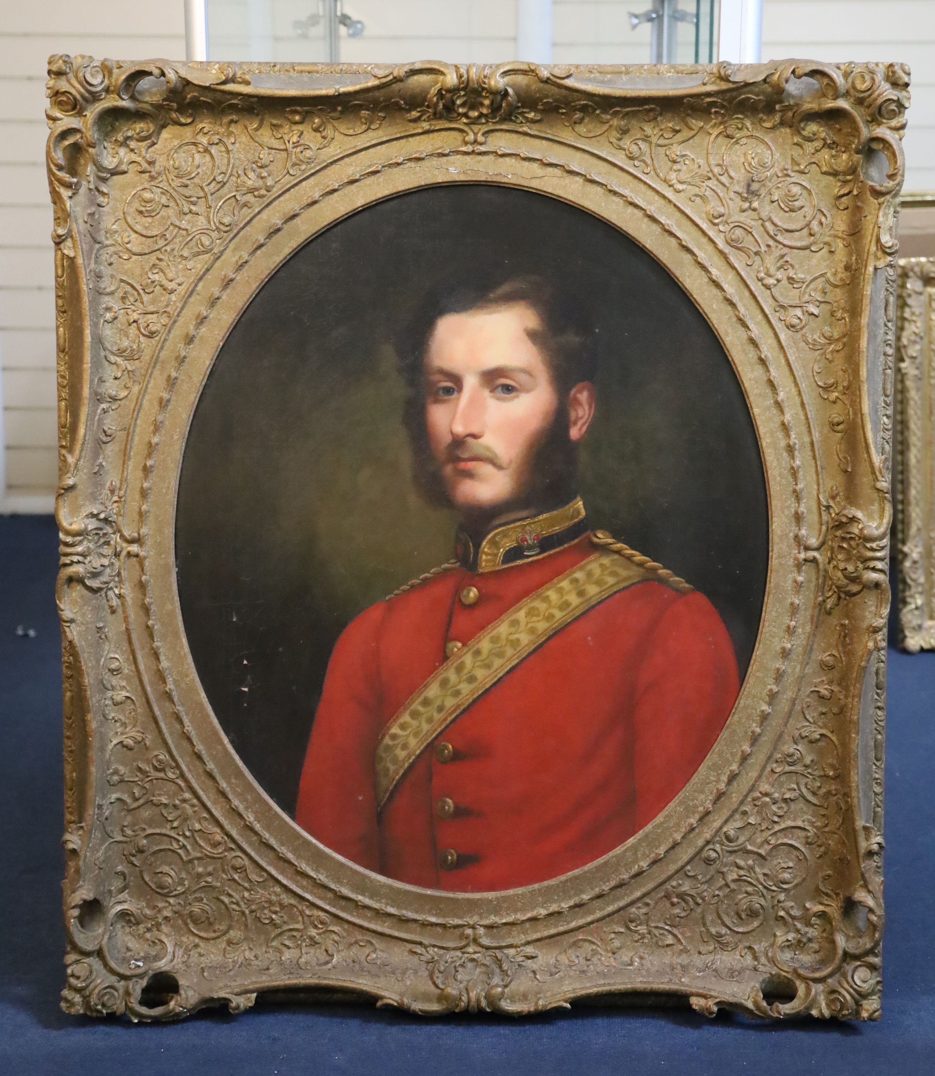 Victorian School Portrait of an army officer framed to the oval, 29.5 x 24.5in.